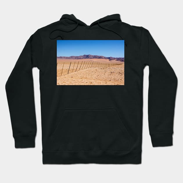 Fence across the desert. Hoodie by sma1050